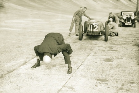 Sepia photo of racing car driver