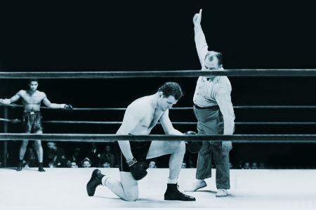 Boxer receiving a standing eight count