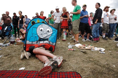 People asleep in a tiny tent