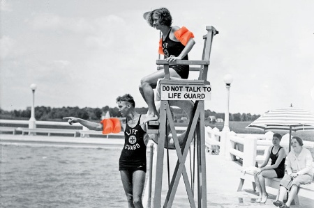 Male and female lifeguards (black and white)