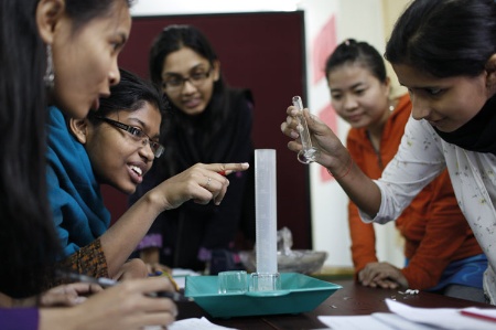 Female science students at work