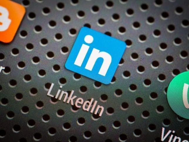 The logo of popular social media app LinkedIn showing on a mobile phone screen