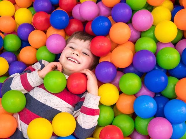 Young boy in ball pit