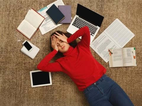 A stressed student prepares for an online exam. Assessment online brings a new set of problems for academics to be aware of