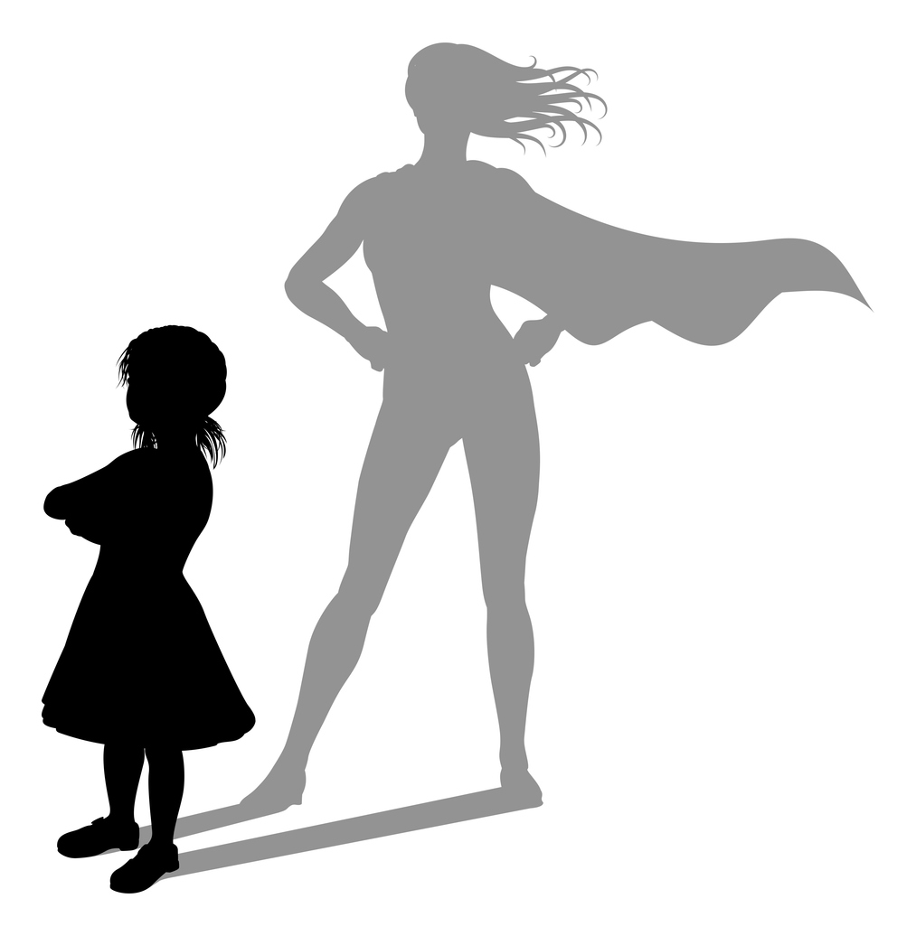 Small girl whose shadow is a superhero