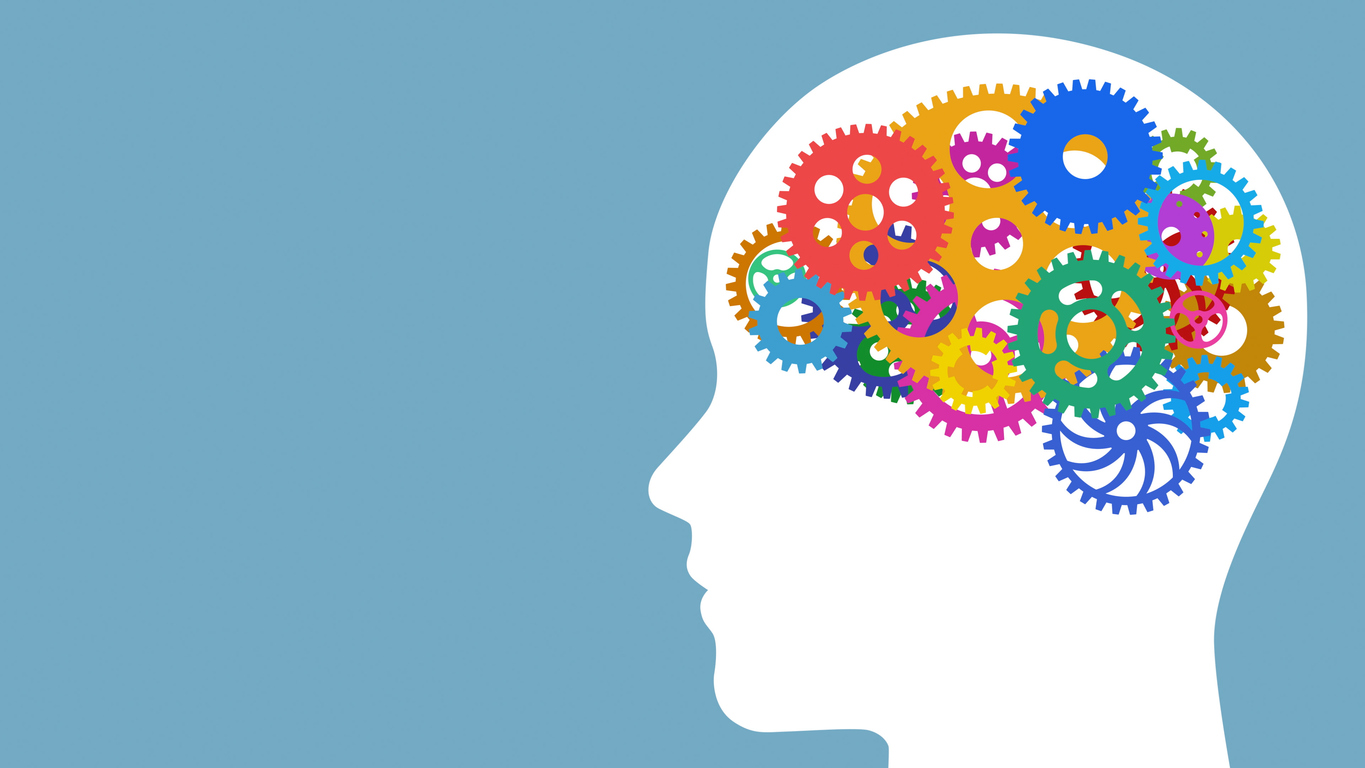 Image of head, with cogs and wheels where brain should be