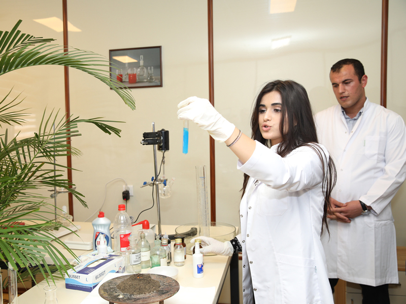 Students at Baku State University doing practical work in a laboratory