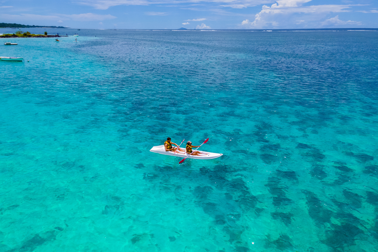 Canoers, on Mauritius beach