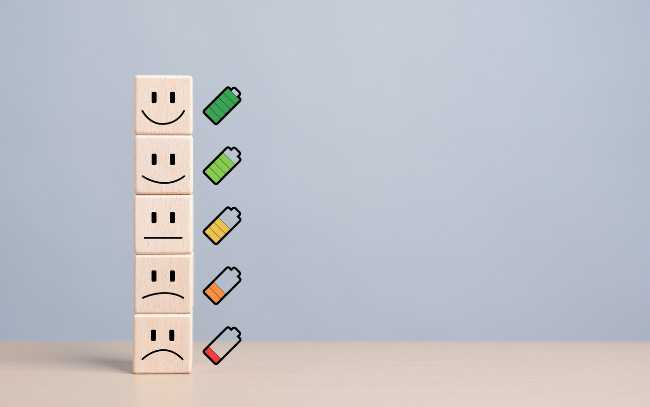 Five faces, with images of batteries running out of power next to them