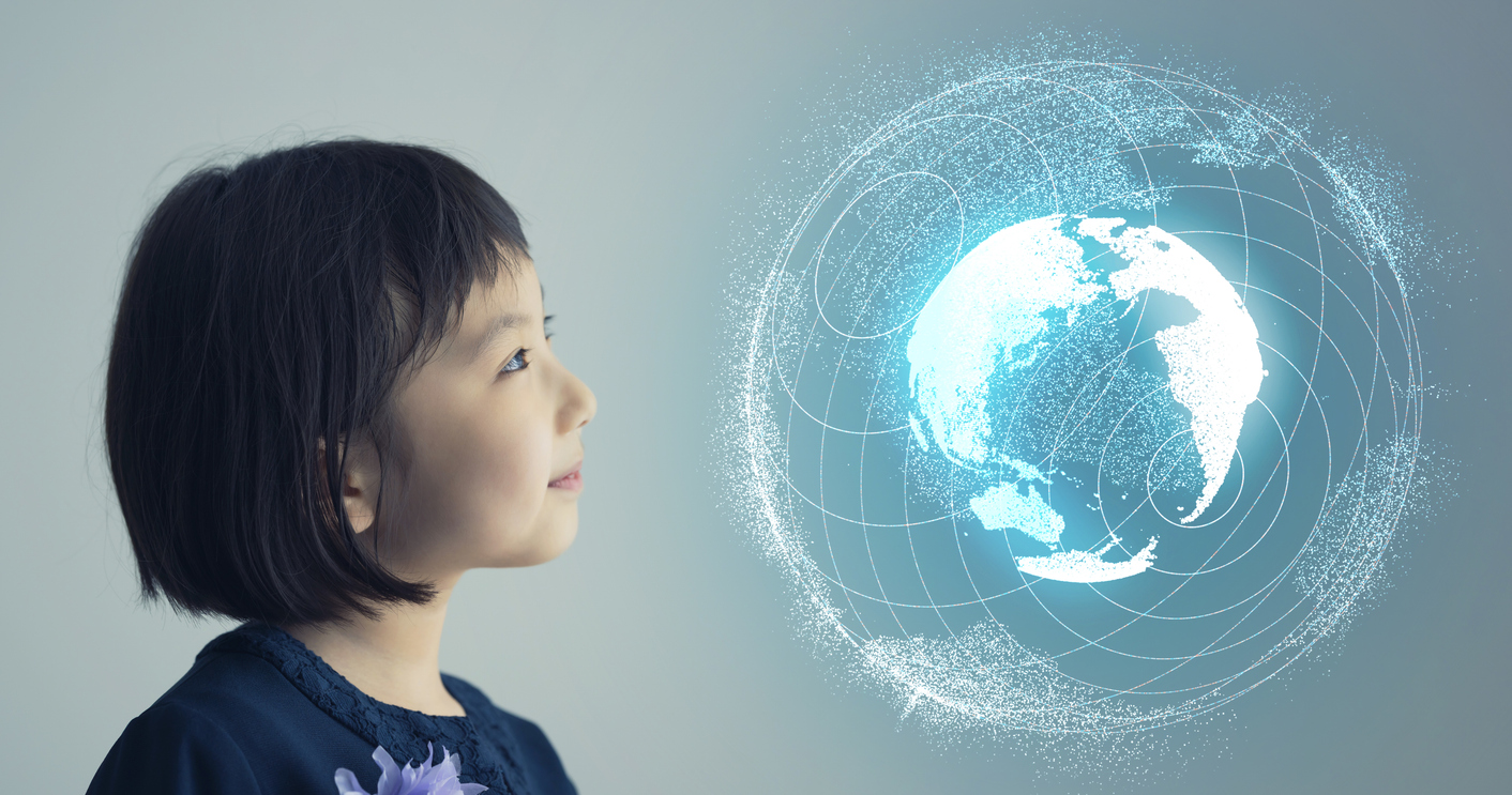 Child looking at hologram of Planet Earth