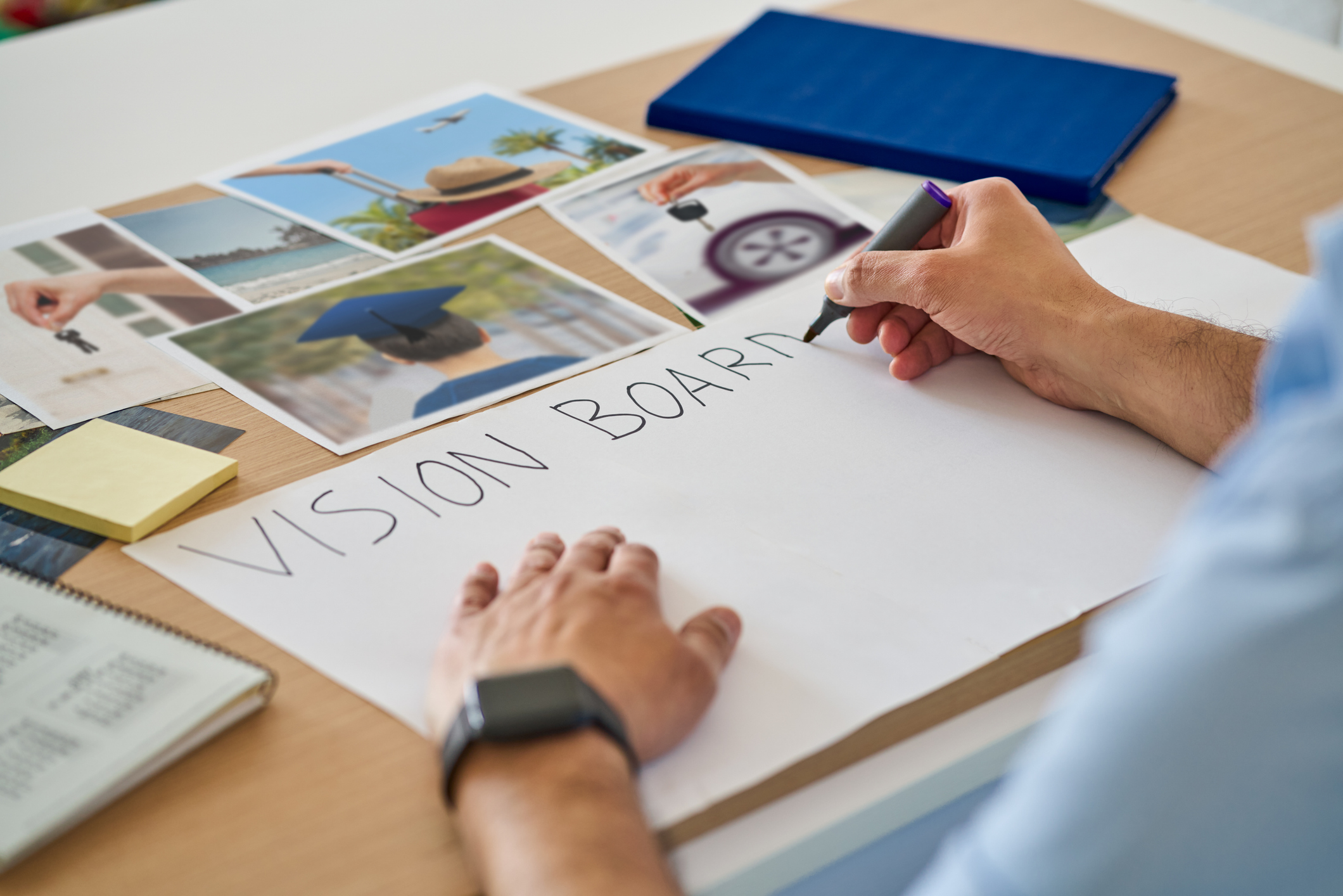 Person creating a vision board