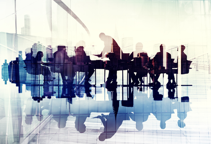 Abstract image of a board meeting