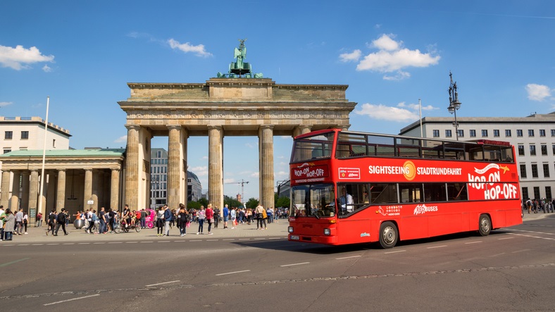 A double-decker bus at the Brandenburg Gate