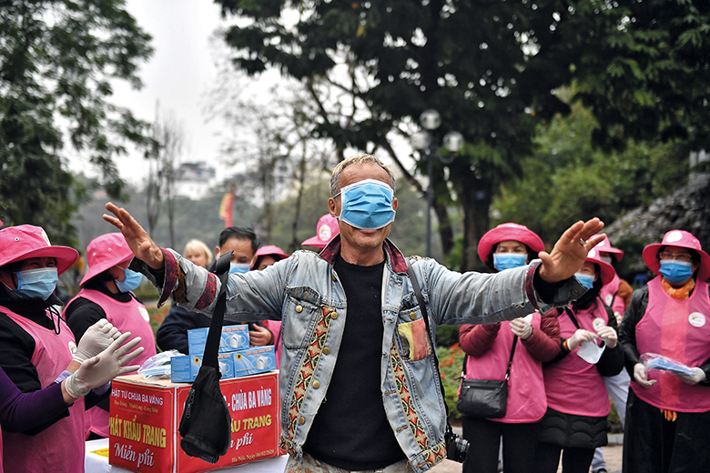 Man with face mask covering eyes