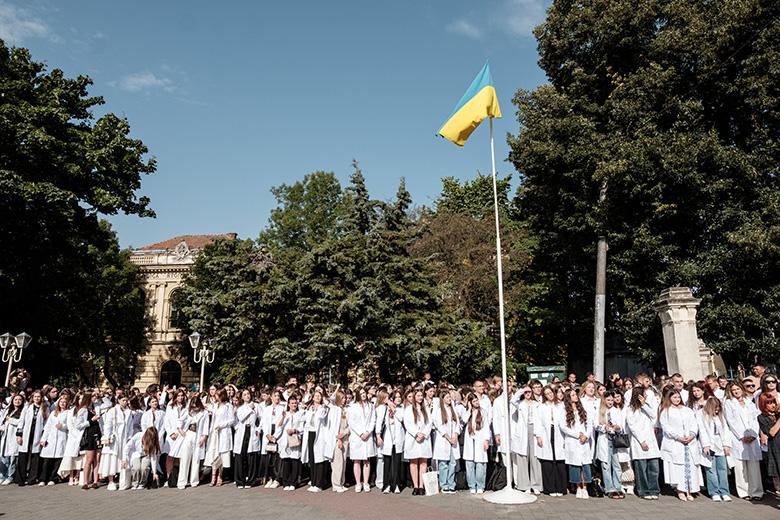Students of Danylo Halytskyi National Medical University of Lviv put on white doctor's coats during the celebrations for the beginning of the new school year on 29 August, 2025 in Lviv, Ukraine.