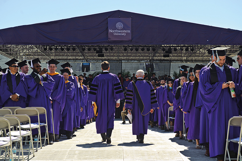 Seth Meyers (left) and Northwestern University president Morton O. Schapiro attend the Northwestern University commencement, 2016