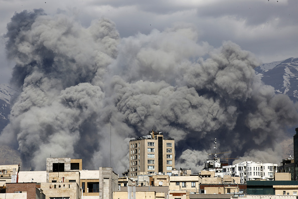 Smoke rises in Tehran after it was hit by US and Israeli missiles on March 1