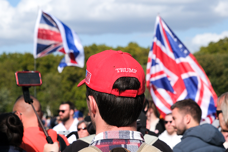 People attend a Charlie Kirk memorial rally by Turning Point UK in Hyde Park, London, 21 September 2025