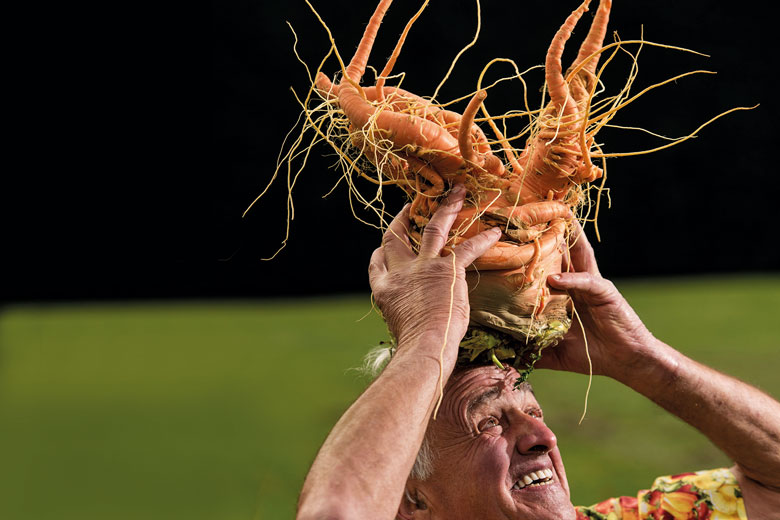 Man inspecting a carrot as a metaphor for Is the REF still useful?