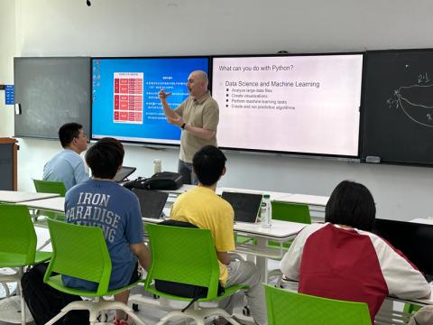 Students at Beijing Institute of Technology's International Summer Programme learn Python programming