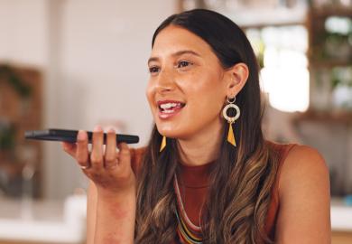 Woman speaking into microphone