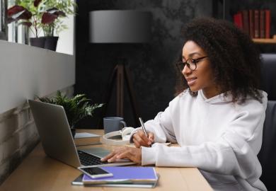 Student at computer, applying for university