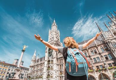 Student looking happy that she's arrived in Munich