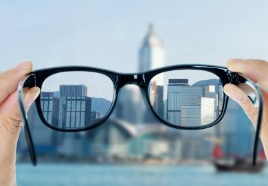 Blurry view seen clearly through glasses