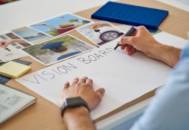 Person creating a vision board