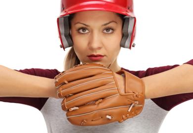 A female baseball pitcher symbolising female leaders