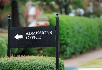 Sign points to 'admissions office'