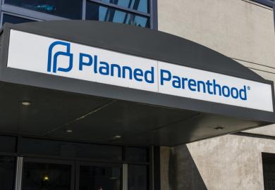 An abortion clinic illustrating an opinion article by Edward C. Halperin about reproductive rights and academic freedom