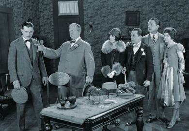 Group of people angry at one man