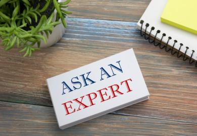 Ask an expert. Business card with message, notepad and flowers