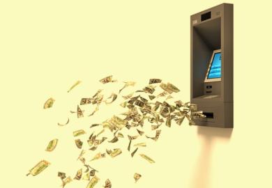 Money flies out of an ATM, symbolising author inflation in finance and accounting