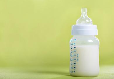 A baby bottle full of milk