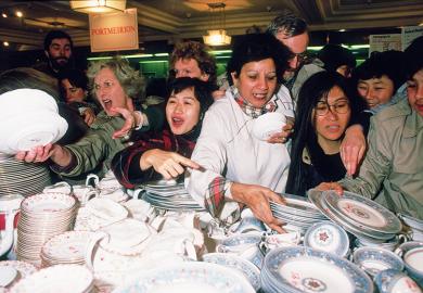 Shoppers jostle for a bargain
