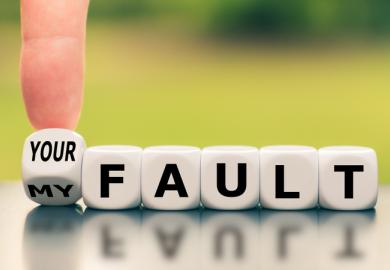 A finger turns a dice and changes the expression "my fault" to "your fault"