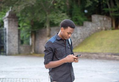 BME sutdent on mobile phone
