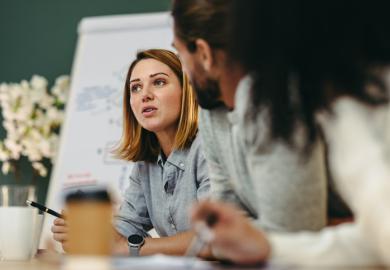 A woman at a business meeting, symbolising entrepreneurship