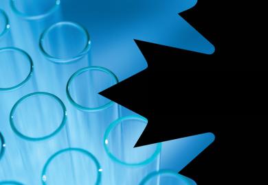 Canadian maple leaf and laboratory test tubes