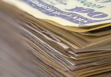 A pile of $100 dollar bills