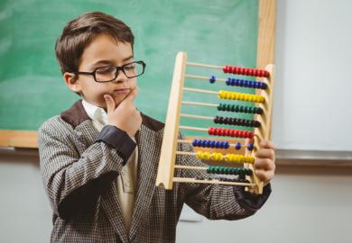 Child with abacus