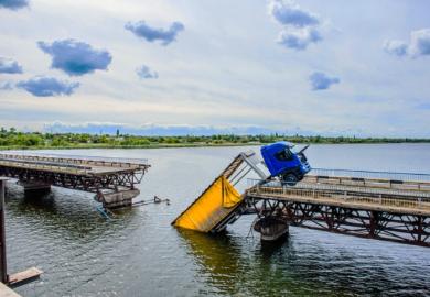 A collapsed bridge, representing failed grand challenges