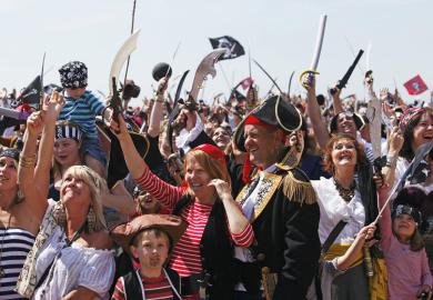 Crowd of people dressed as pirates