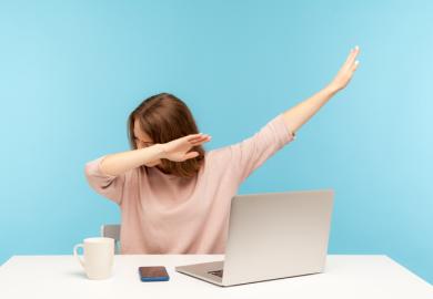 A woman watching a computer and doing a dab dance, symbolising online learning