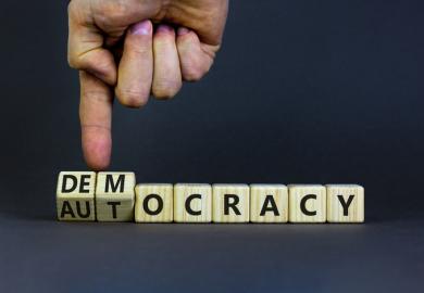 The word "democracy" turns into "autocracy"