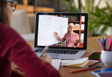 A student watches an online lesson