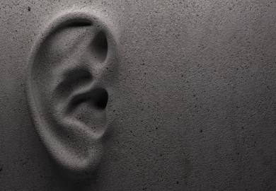 A ear on a wall, symbolising the difficulty of communication