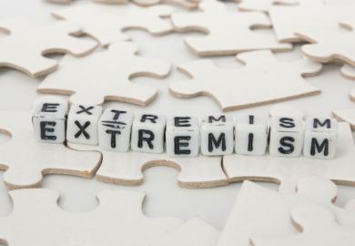 'Extremism' spelled in letter blocks